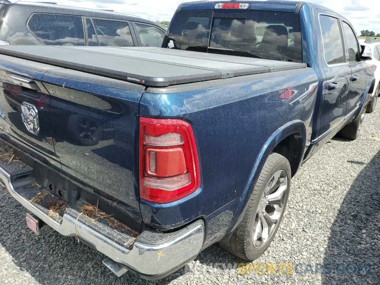 3 Photograph of a damaged car 1C6RREHT3NN358977 RAM 1500 2022