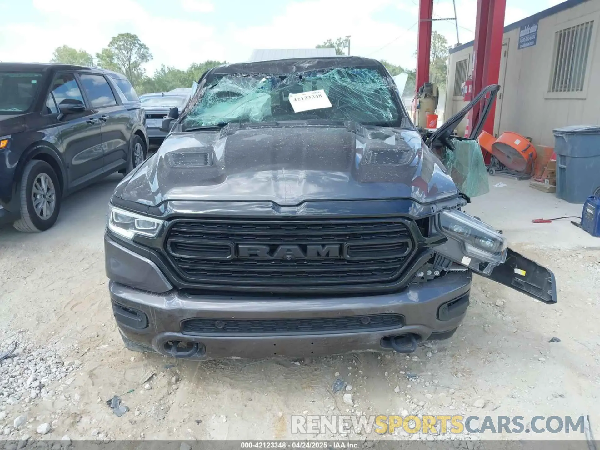 13 Photograph of a damaged car 1C6RREHT8NN187076 RAM 1500 2022