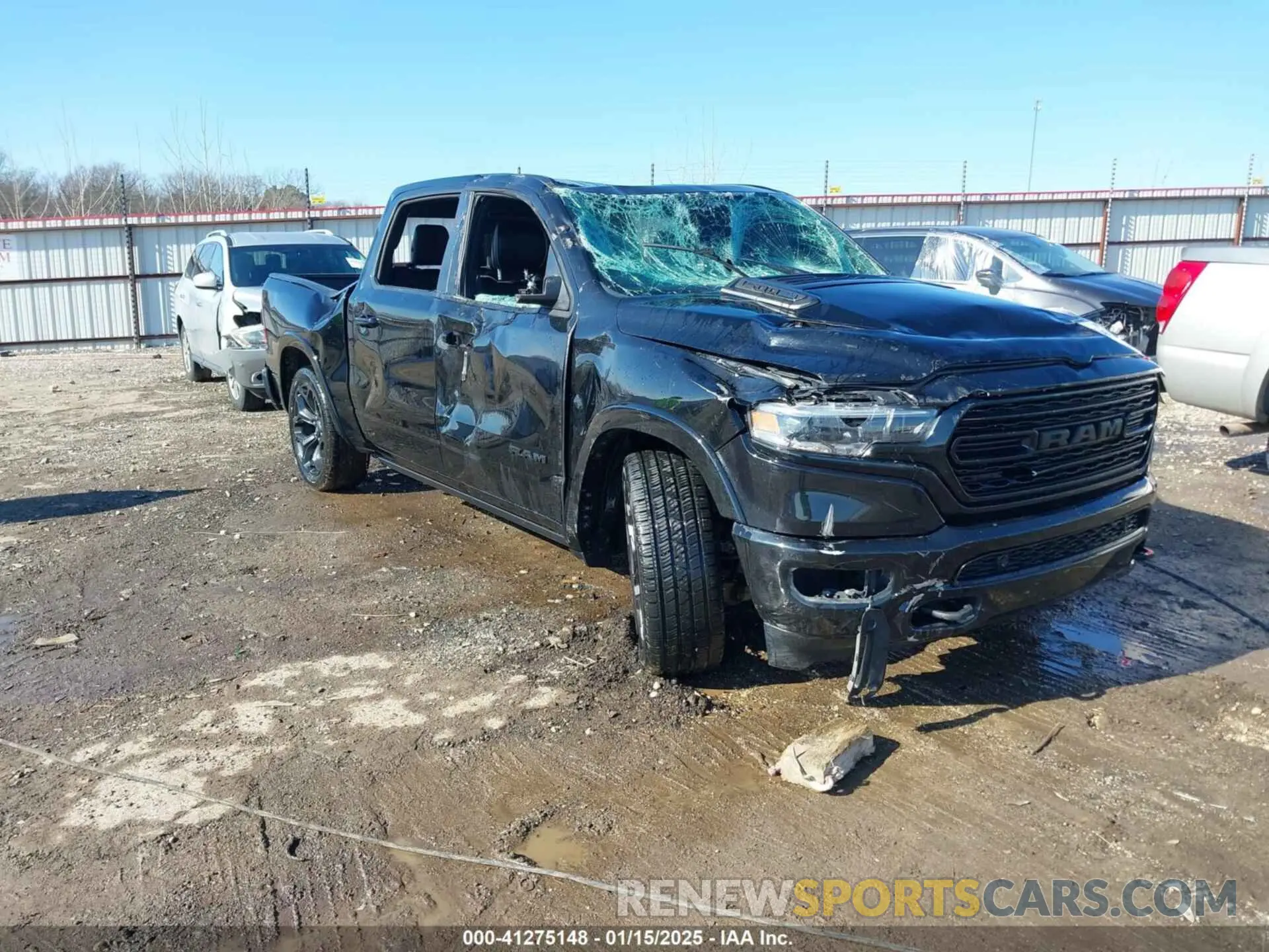 1 Photograph of a damaged car 1C6RREHT9NN152742 RAM 1500 2022