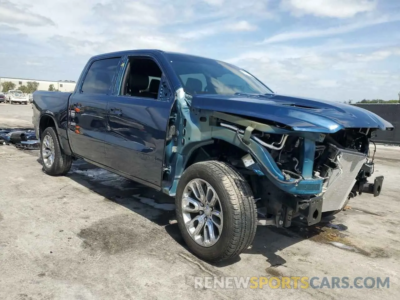 4 Photograph of a damaged car 1C6RREJT0NN291572 RAM 1500 2022