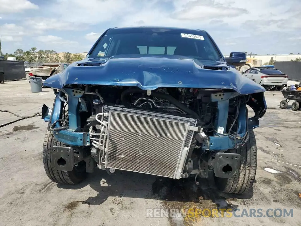 5 Photograph of a damaged car 1C6RREJT0NN291572 RAM 1500 2022