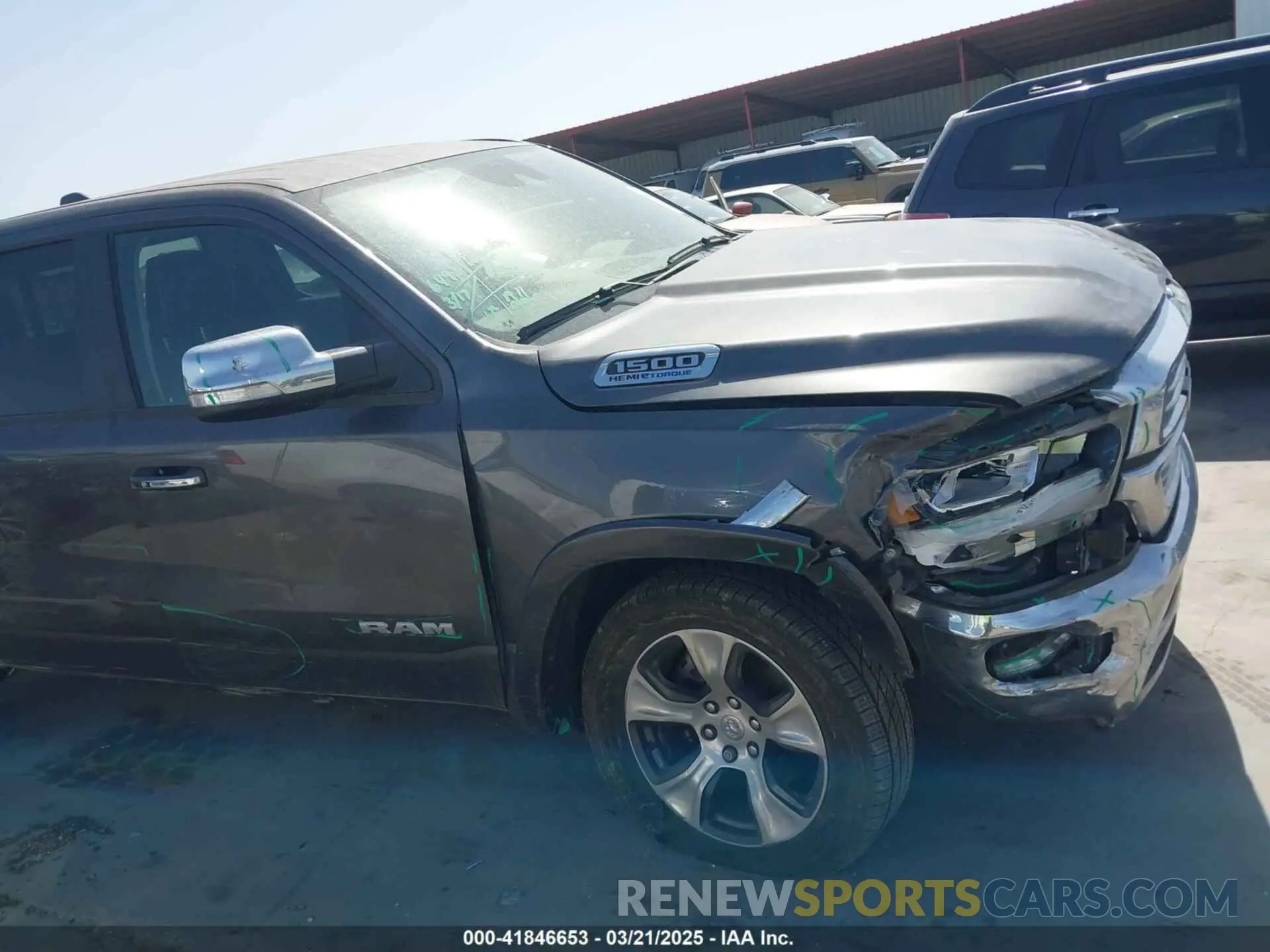 14 Photograph of a damaged car 1C6RREJT1NN393446 RAM 1500 2022