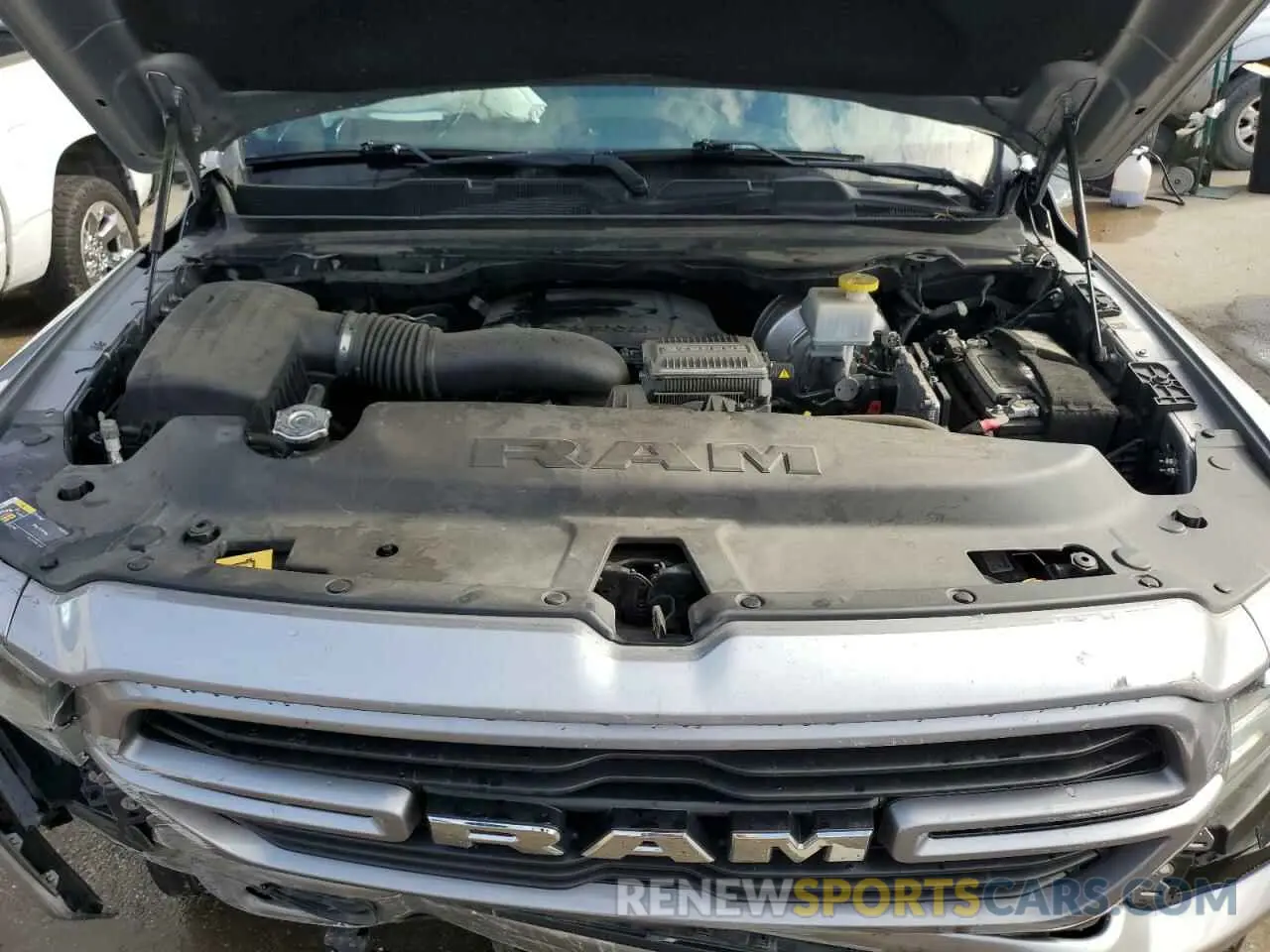 11 Photograph of a damaged car 1C6RREJT9NN383134 RAM 1500 2022