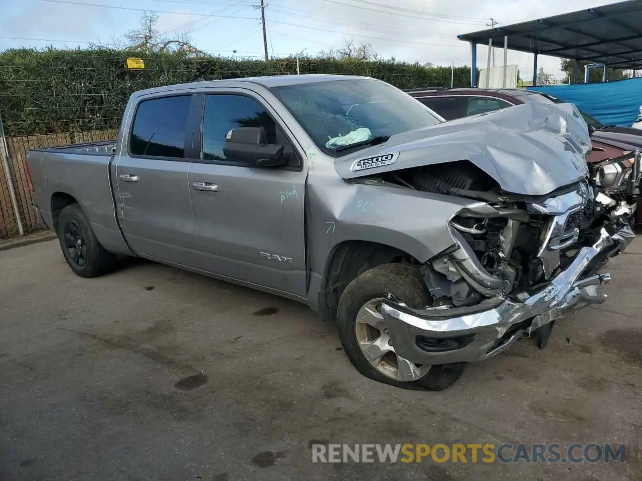 4 Photograph of a damaged car 1C6RREMT0NN382689 RAM 1500 2022