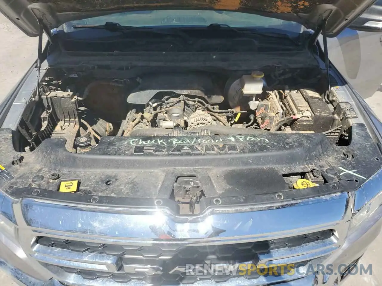 11 Photograph of a damaged car 1C6RREMT3NN227957 RAM 1500 2022