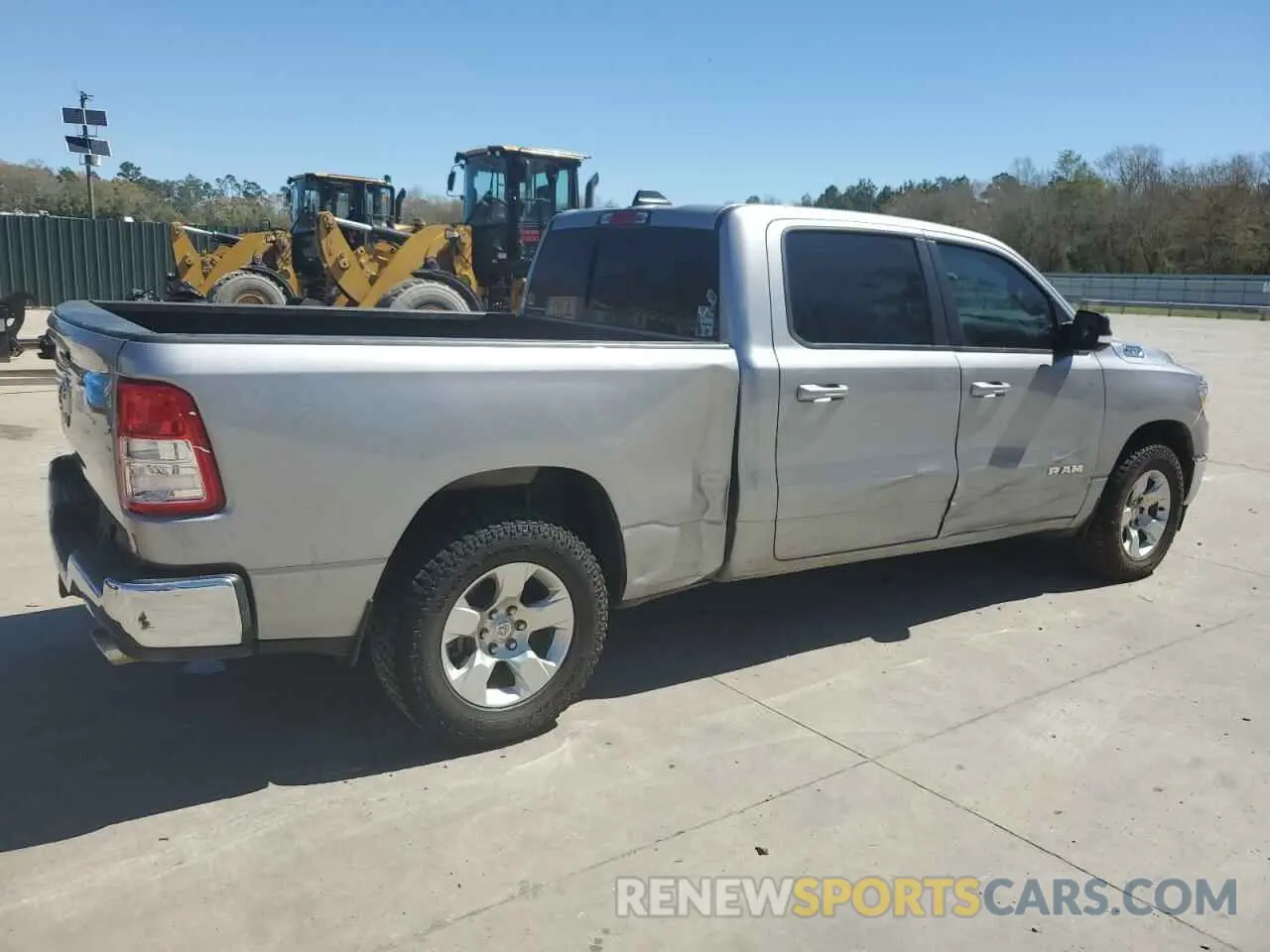 3 Photograph of a damaged car 1C6RREMT3NN227957 RAM 1500 2022