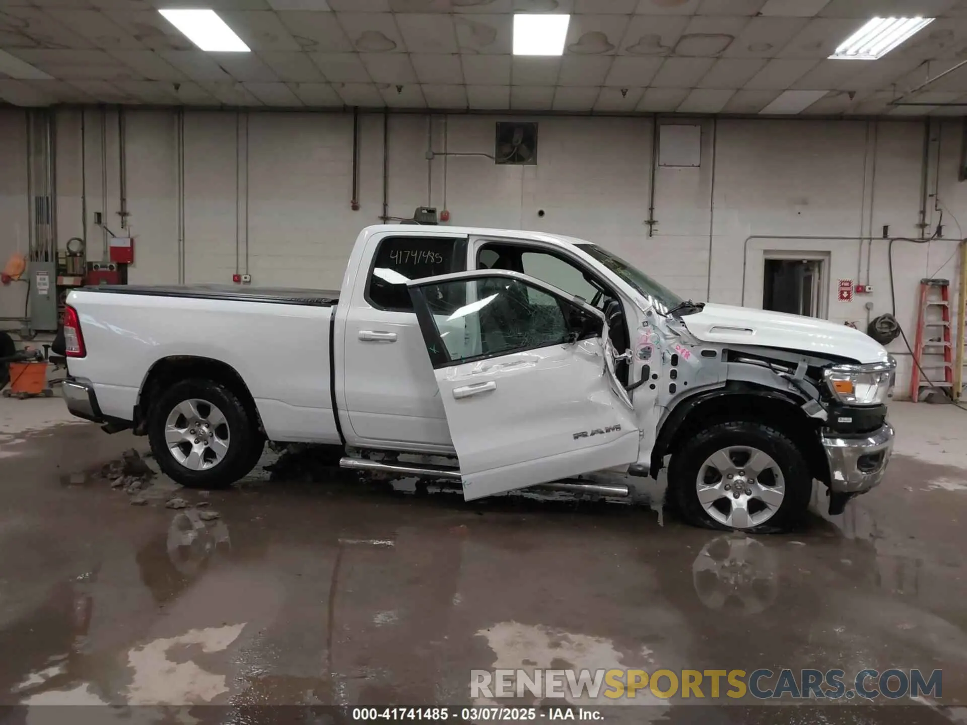 13 Photograph of a damaged car 1C6RRFBG9NN283560 RAM 1500 2022
