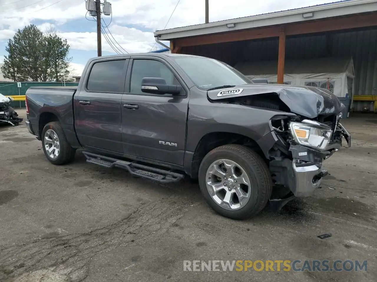 4 Photograph of a damaged car 1C6RRFFG0NN402641 RAM 1500 2022