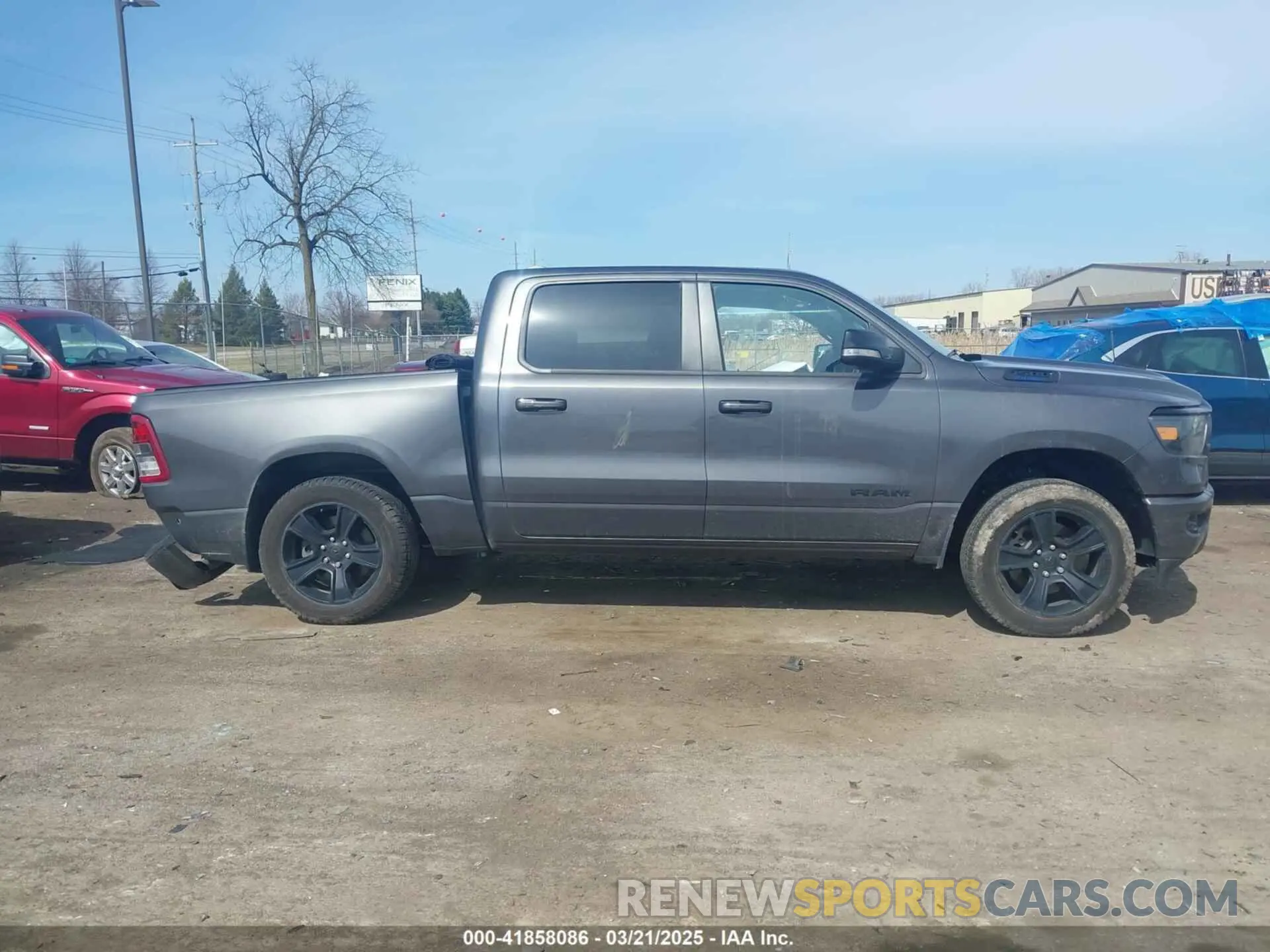 13 Photograph of a damaged car 1C6RRFFG0NN410013 RAM 1500 2022