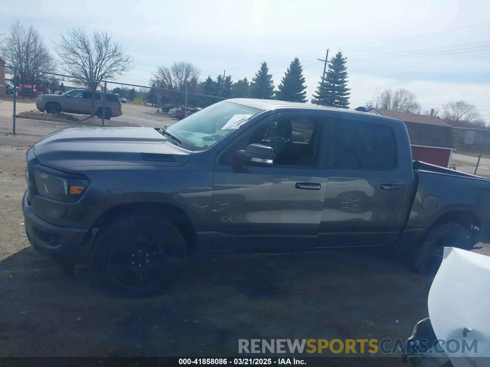 14 Photograph of a damaged car 1C6RRFFG0NN410013 RAM 1500 2022