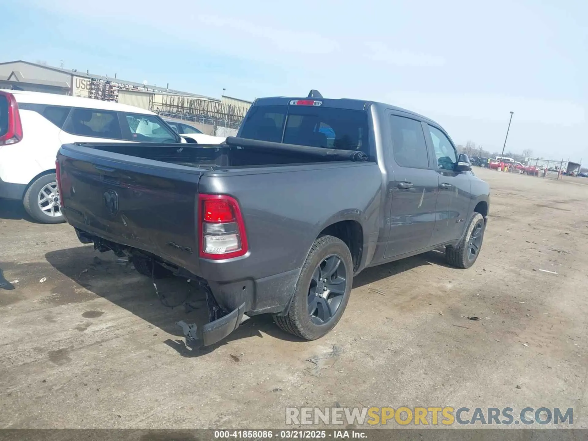 4 Photograph of a damaged car 1C6RRFFG0NN410013 RAM 1500 2022