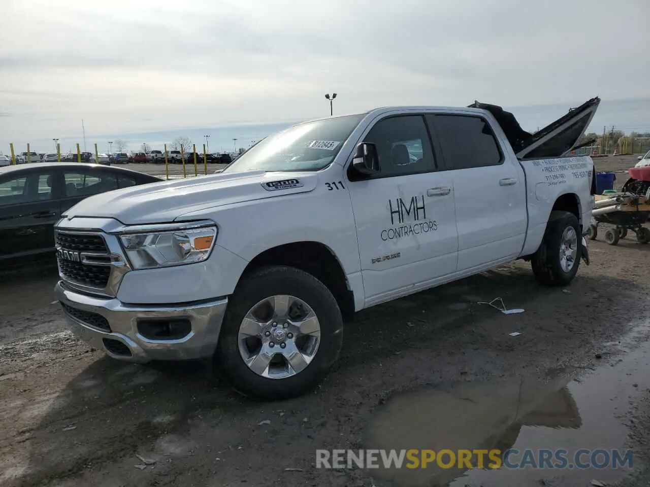 1 Photograph of a damaged car 1C6RRFFG1NN179347 RAM 1500 2022