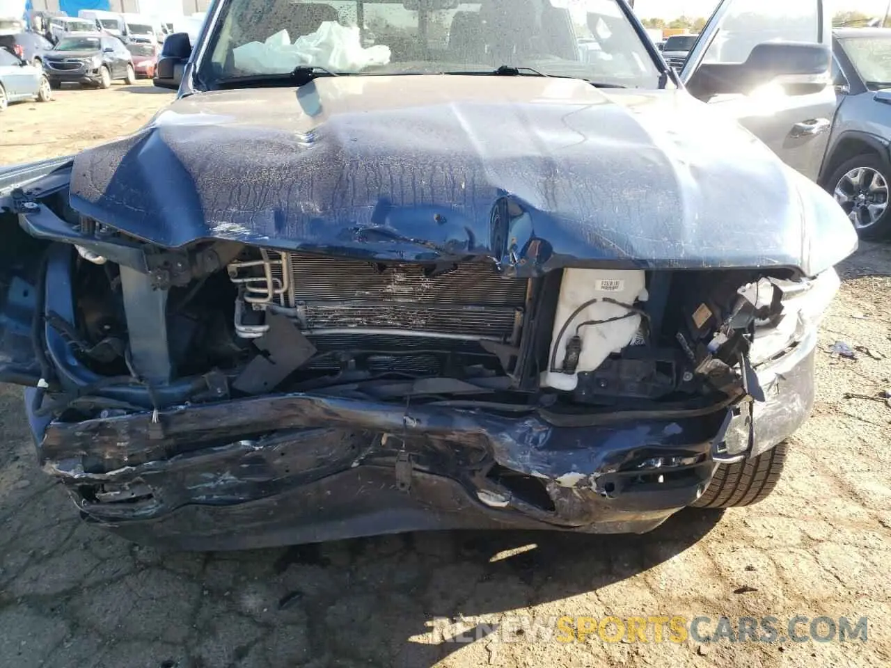 11 Photograph of a damaged car 1C6RRFFG2NN301360 RAM 1500 2022