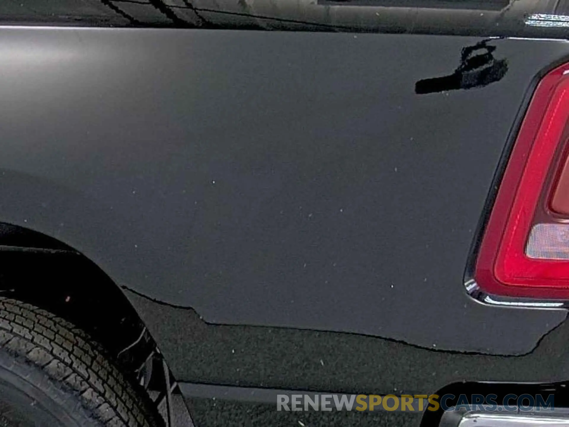 31 Photograph of a damaged car 1C6RRFFG3NN179009 RAM 1500 2022