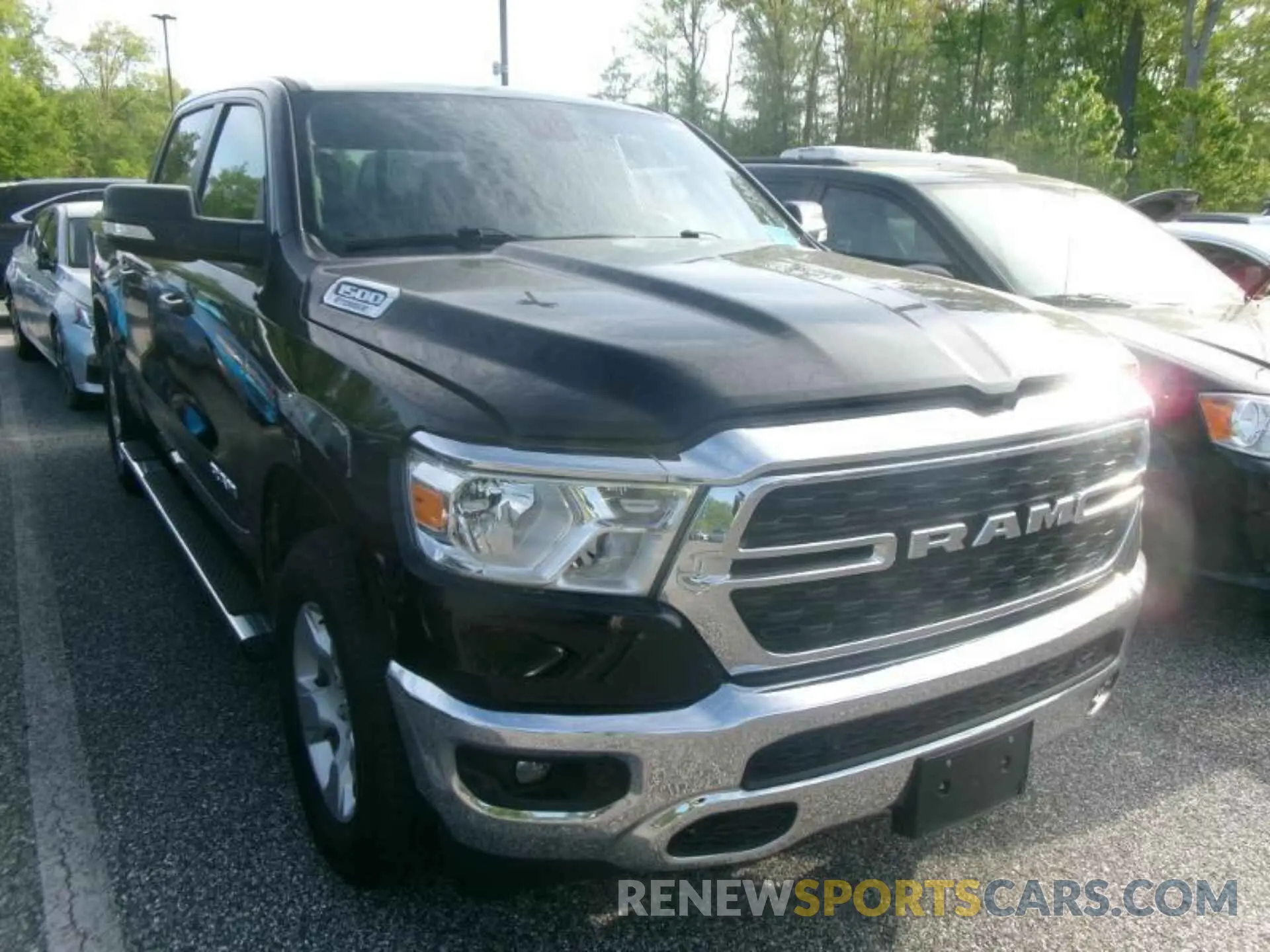 1 Photograph of a damaged car 1C6RRFFG3NN389917 RAM 1500 2022