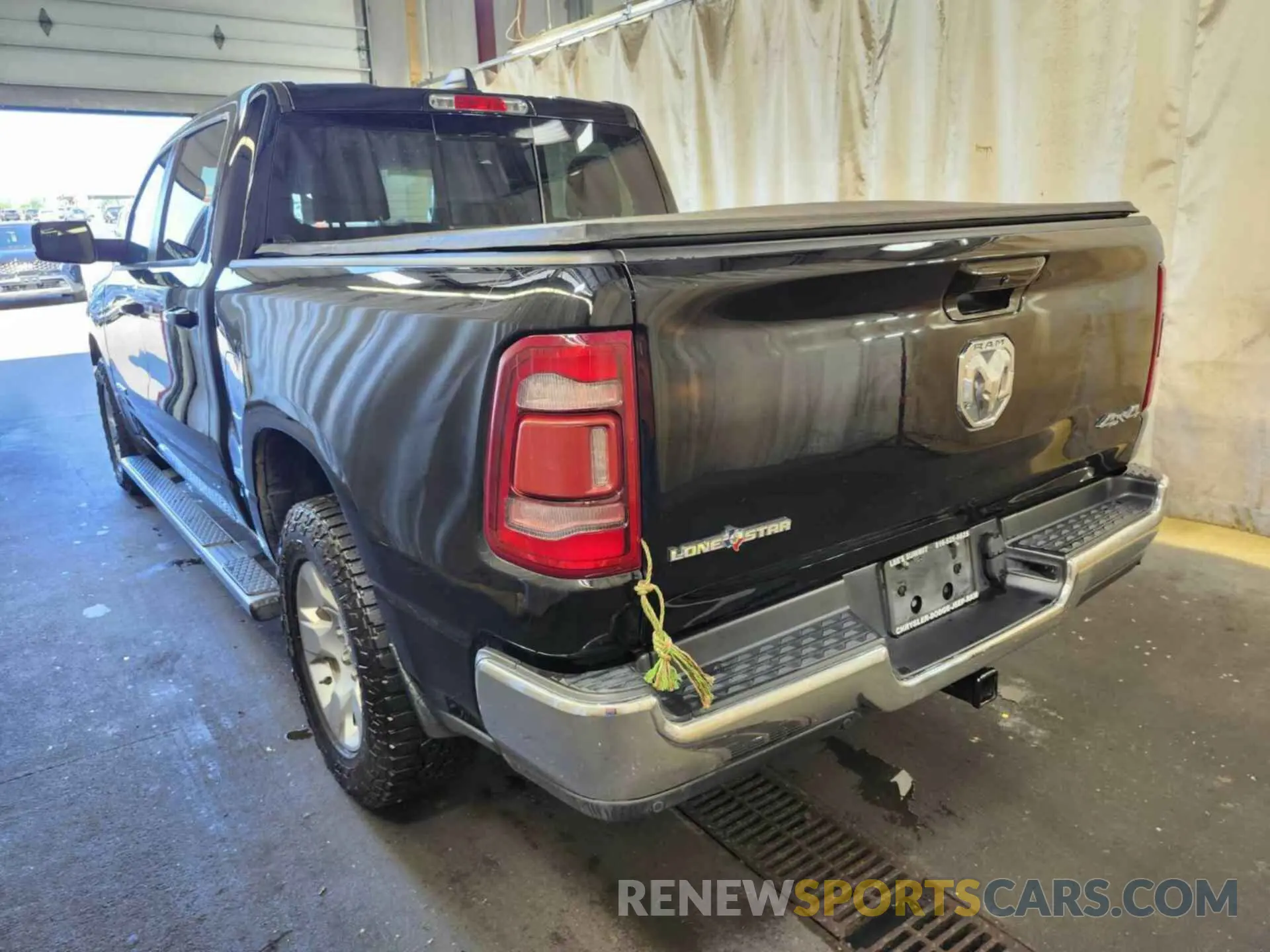 14 Photograph of a damaged car 1C6RRFFG4NN269611 RAM 1500 2022