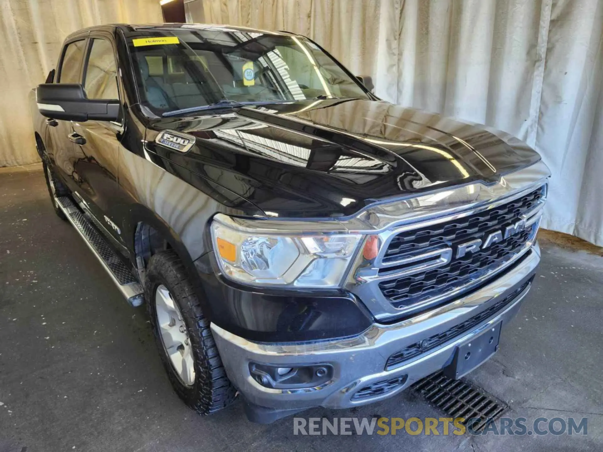 9 Photograph of a damaged car 1C6RRFFG4NN269611 RAM 1500 2022