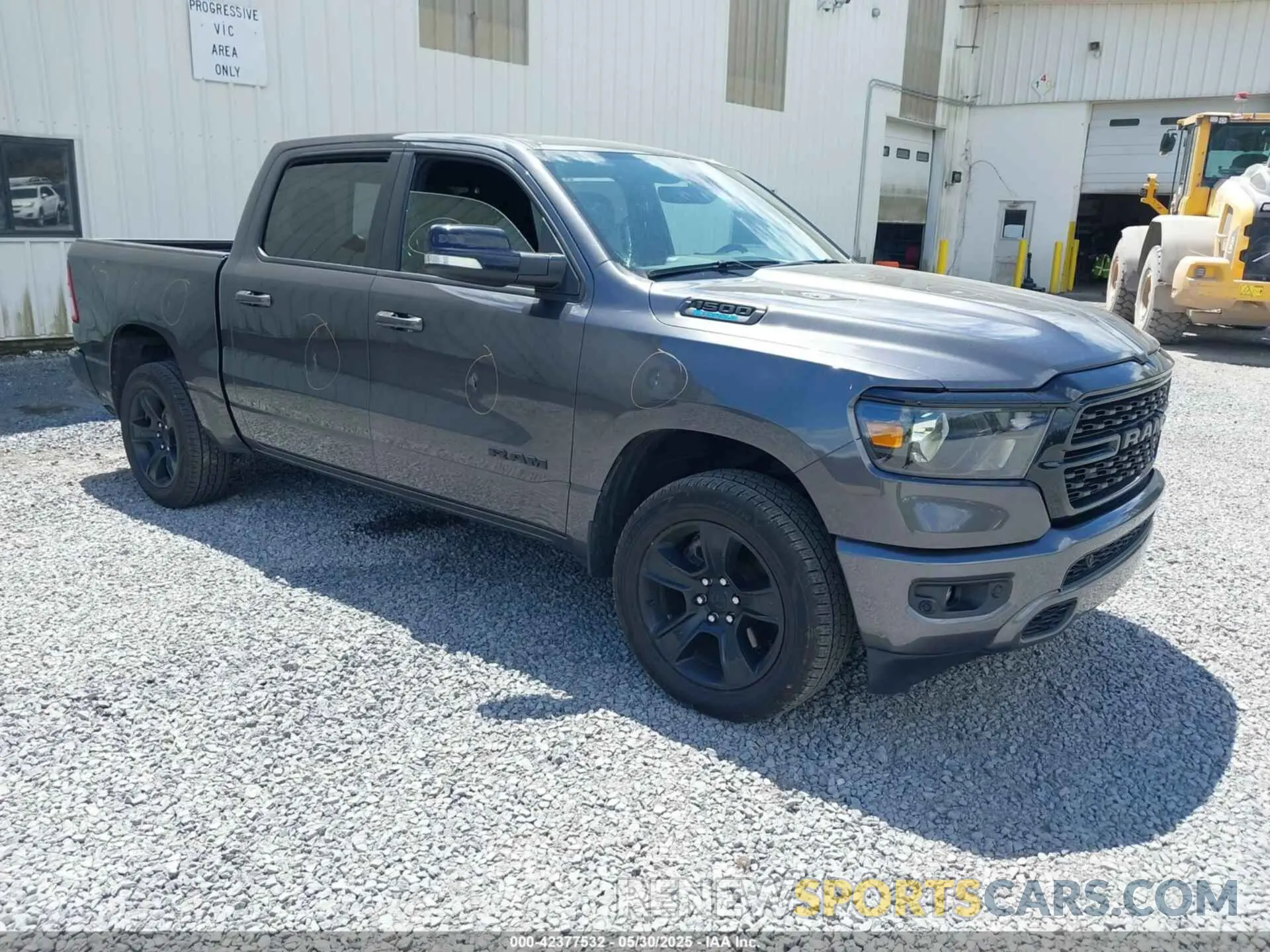 1 Photograph of a damaged car 1C6RRFFG4NN379347 RAM 1500 2022