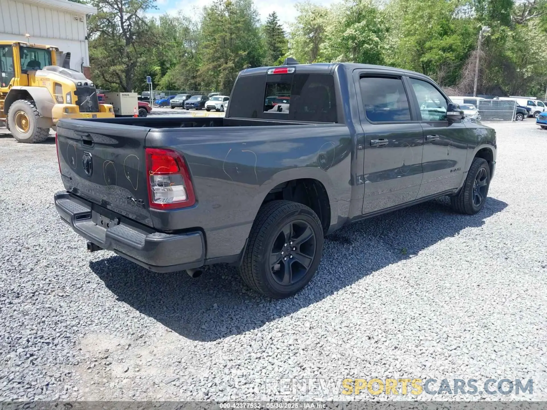 4 Photograph of a damaged car 1C6RRFFG4NN379347 RAM 1500 2022