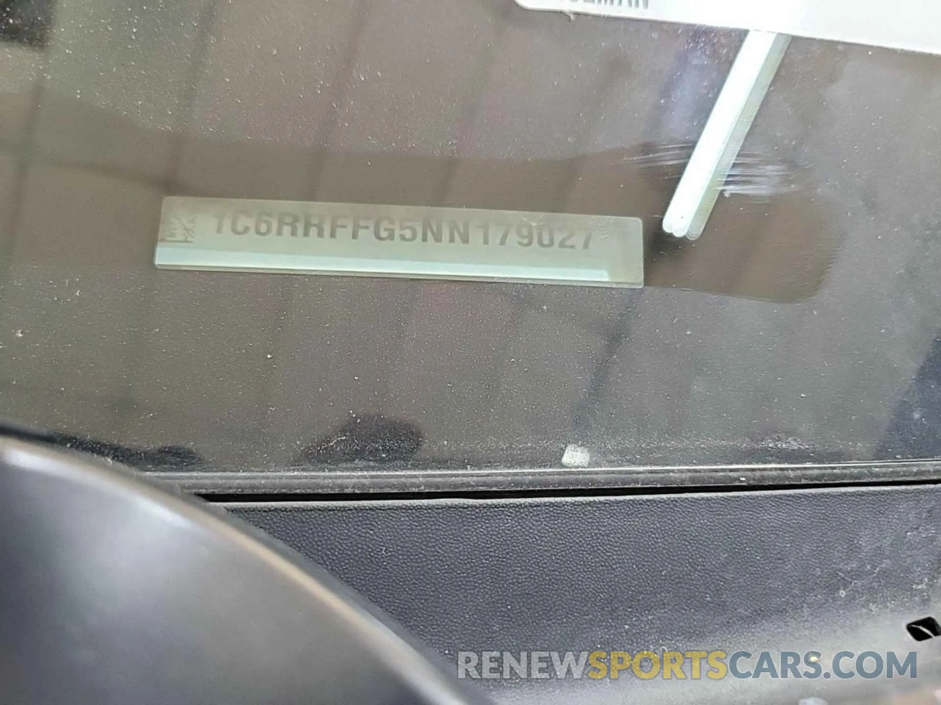 24 Photograph of a damaged car 1C6RRFFG5NN179027 RAM 1500 2022