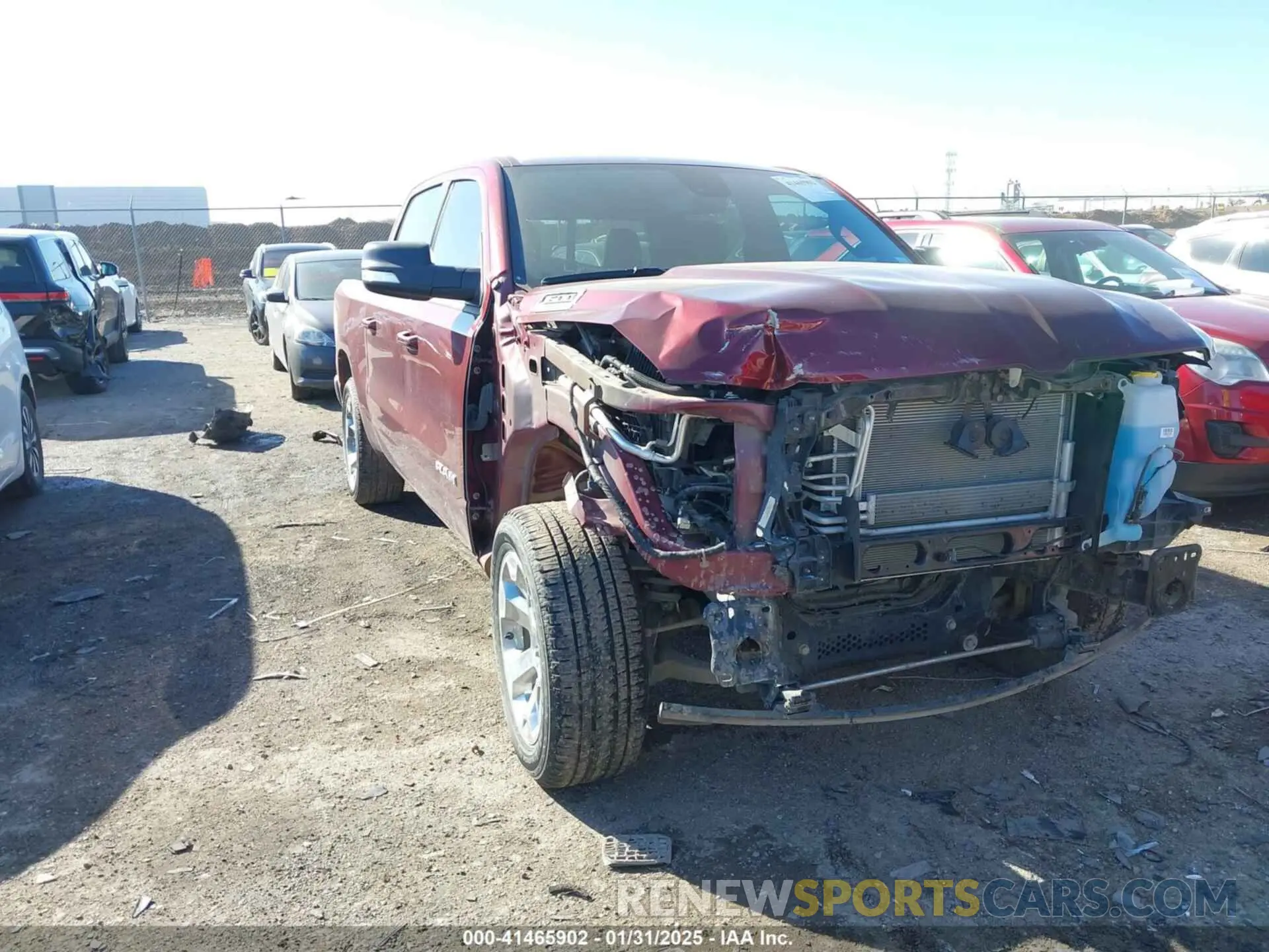 1 Photograph of a damaged car 1C6RRFFG5NN298325 RAM 1500 2022