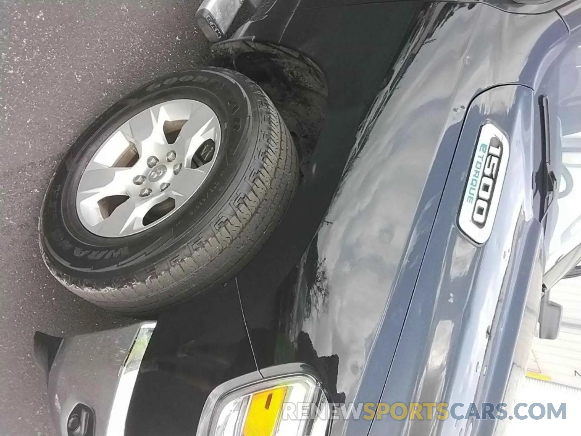 14 Photograph of a damaged car 1C6RRFFG6NN179036 RAM 1500 2022