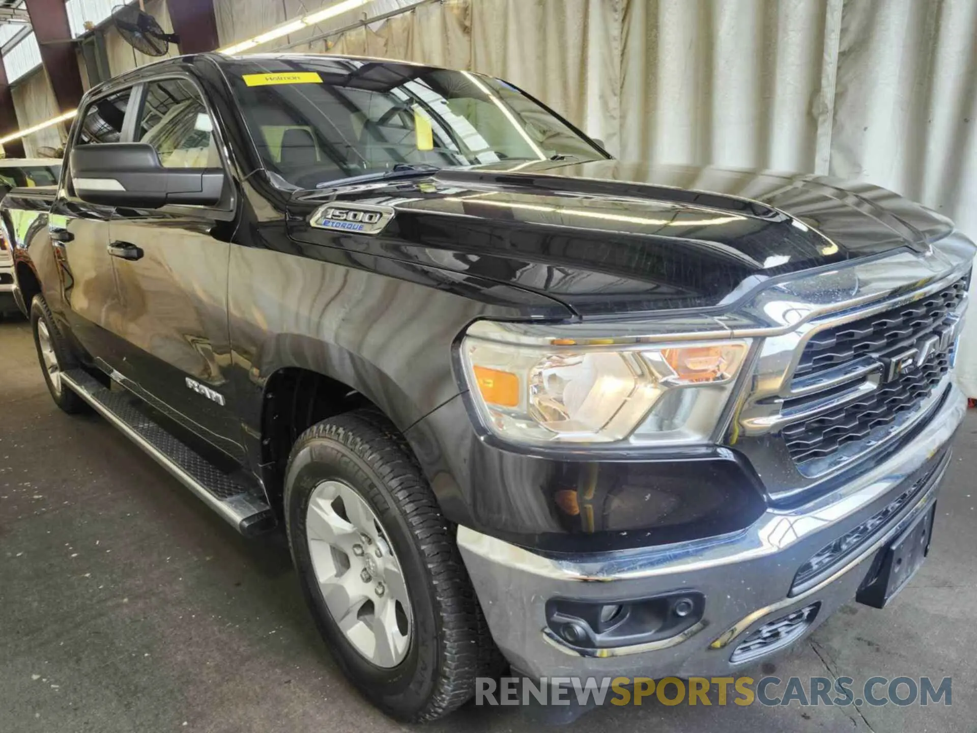 11 Photograph of a damaged car 1C6RRFFG6NN190926 RAM 1500 2022