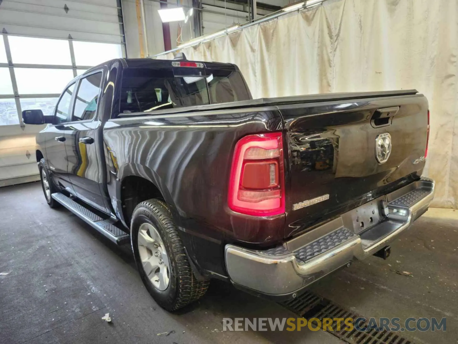 21 Photograph of a damaged car 1C6RRFFG6NN190926 RAM 1500 2022