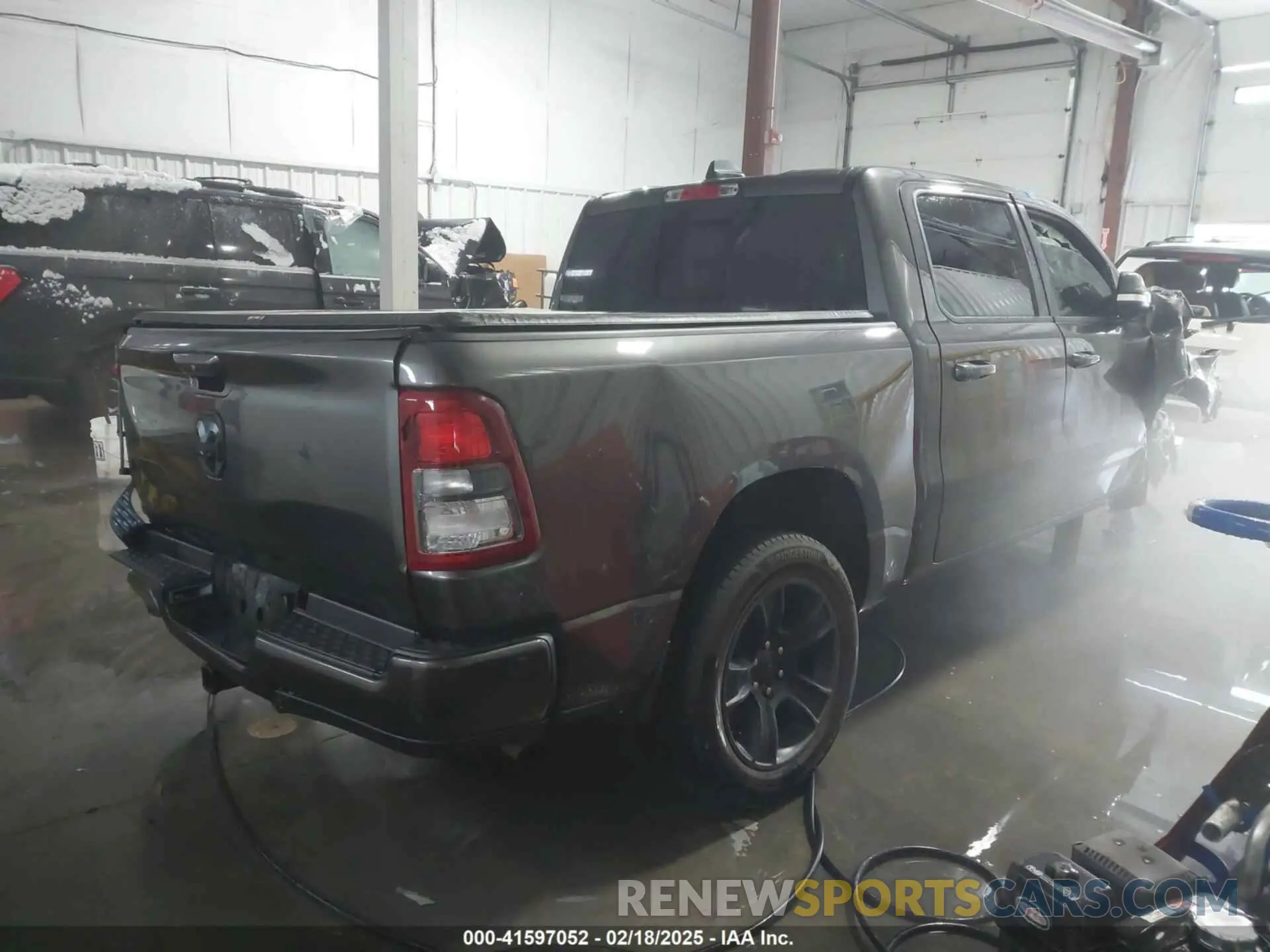 4 Photograph of a damaged car 1C6RRFFG6NN225710 RAM 1500 2022