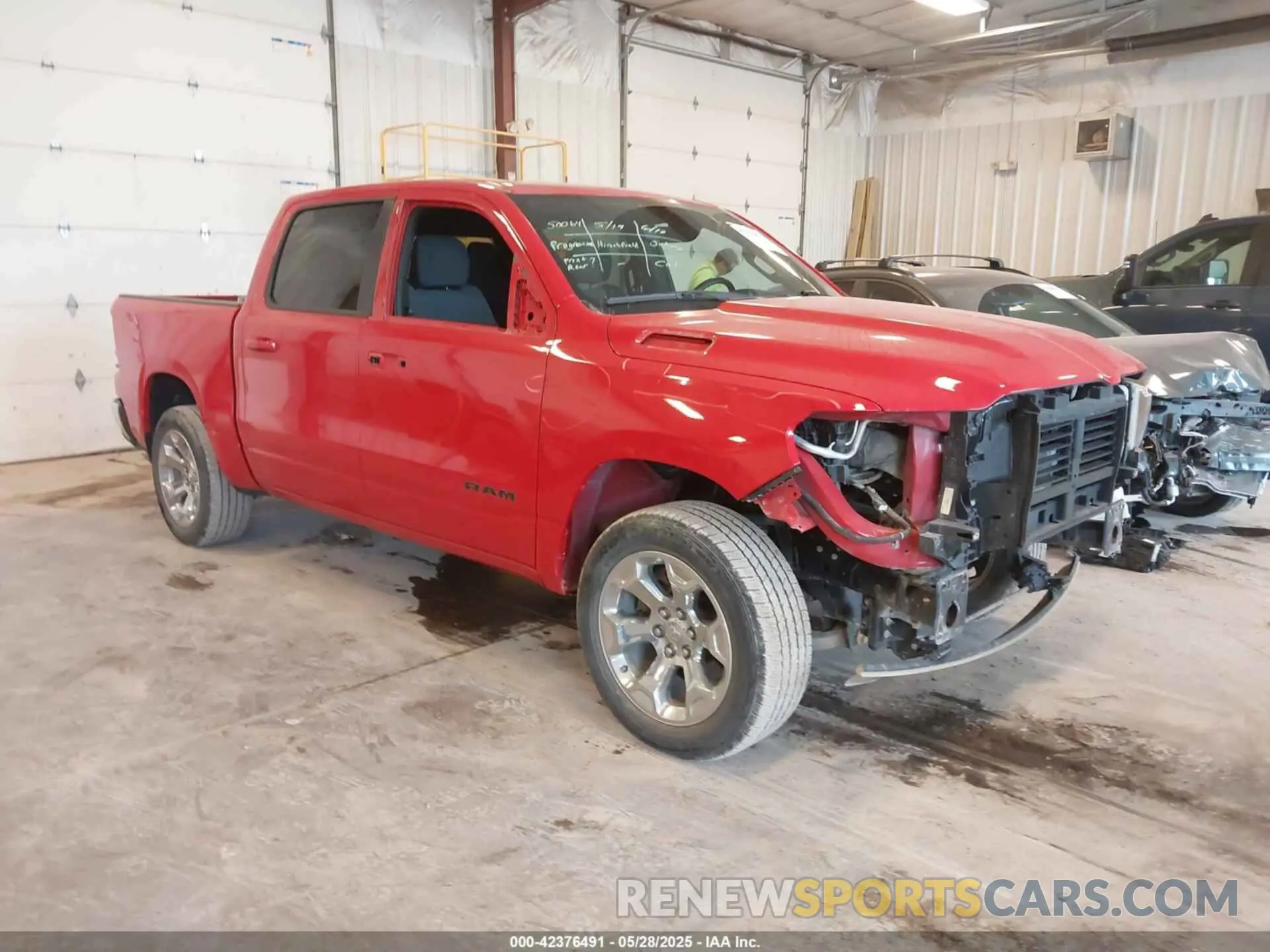 1 Photograph of a damaged car 1C6RRFFG7NN455417 RAM 1500 2022