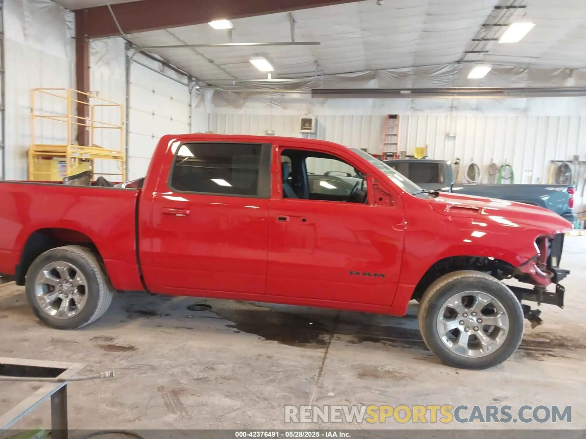 13 Photograph of a damaged car 1C6RRFFG7NN455417 RAM 1500 2022