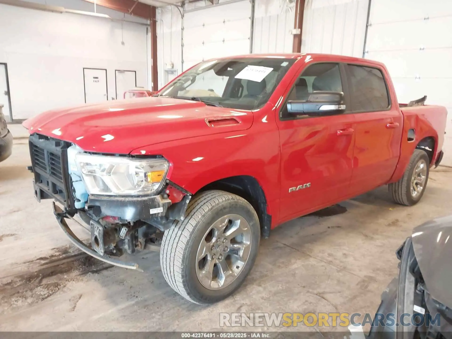 2 Photograph of a damaged car 1C6RRFFG7NN455417 RAM 1500 2022