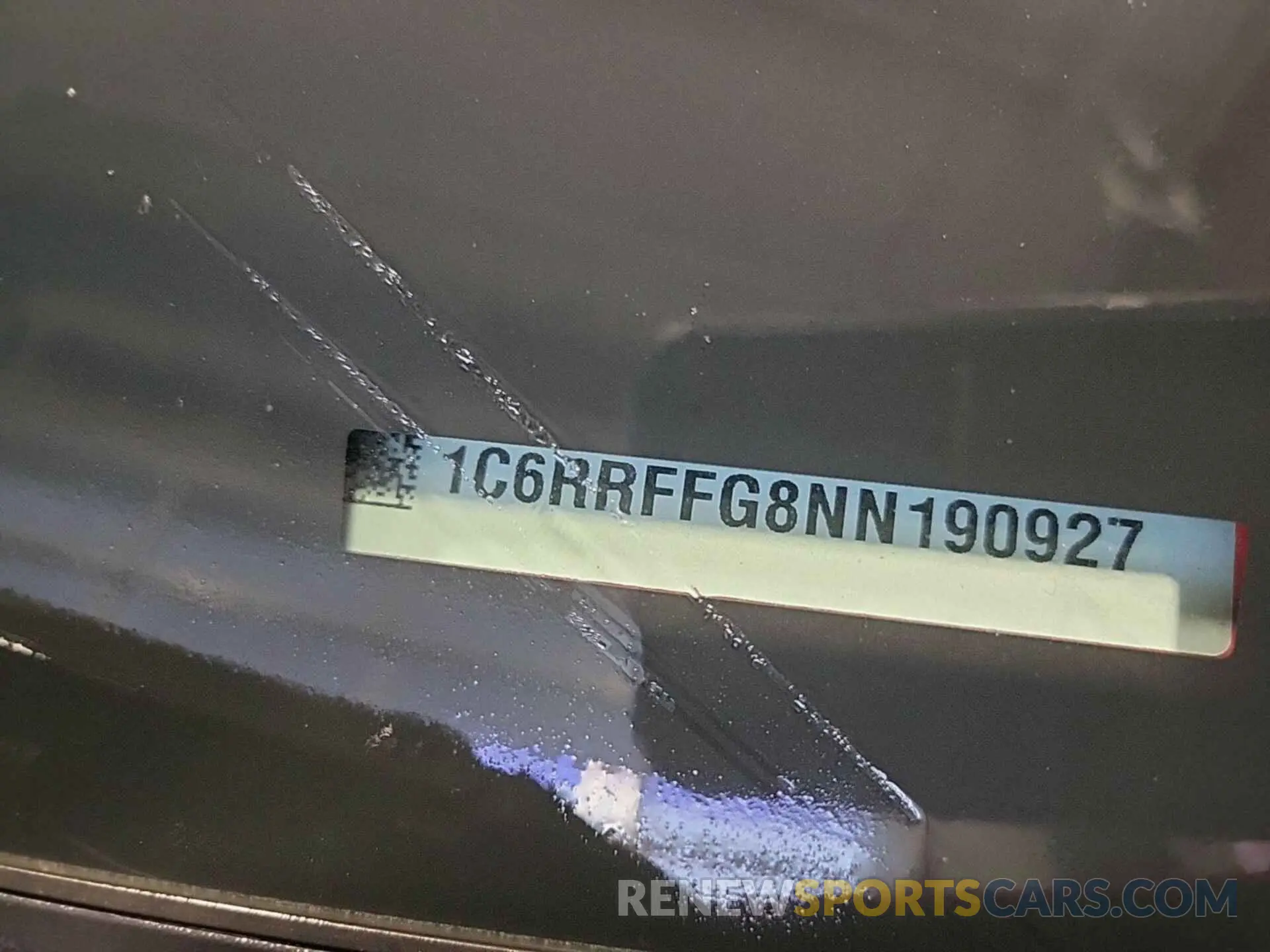 4 Photograph of a damaged car 1C6RRFFG8NN190927 RAM 1500 2022
