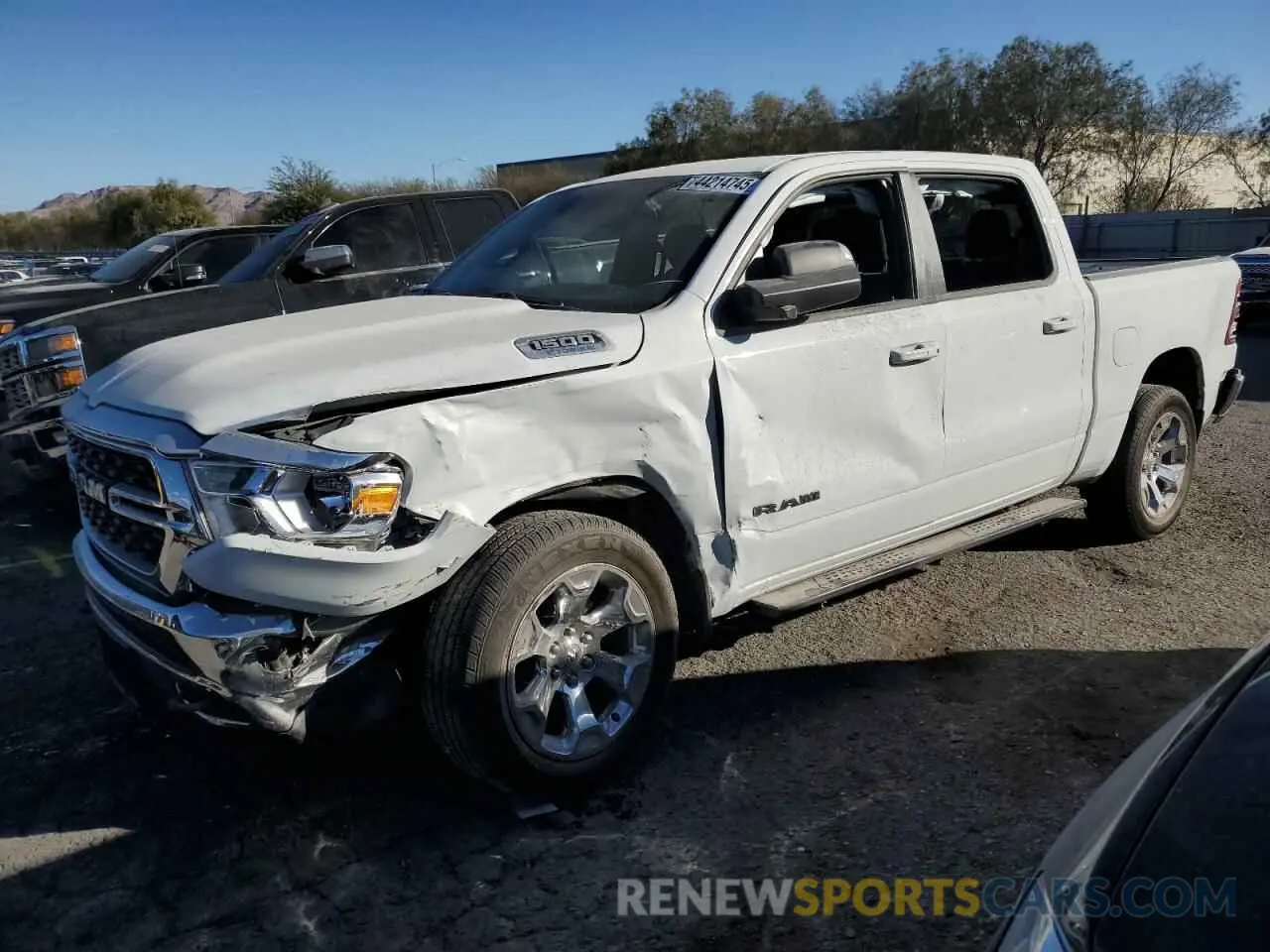 1 Photograph of a damaged car 1C6RRFFG8NN457385 RAM 1500 2022