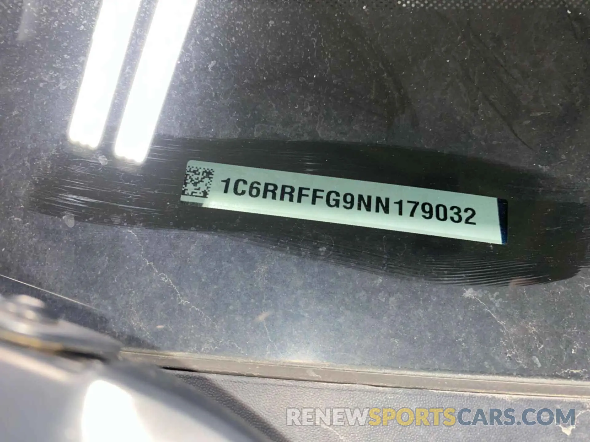 11 Photograph of a damaged car 1C6RRFFG9NN179032 RAM 1500 2022