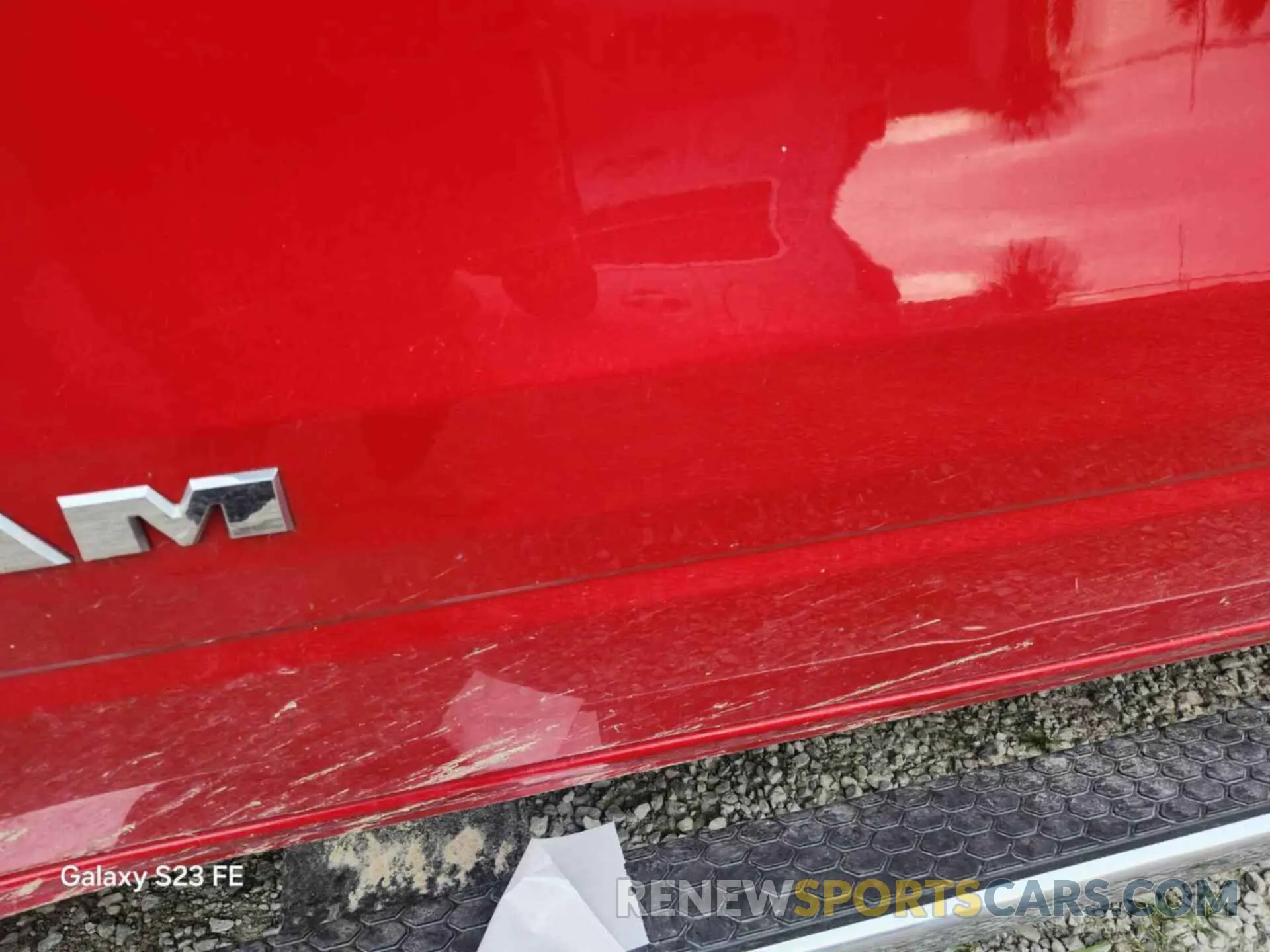 11 Photograph of a damaged car 1C6RRFFG9NN187809 RAM 1500 2022