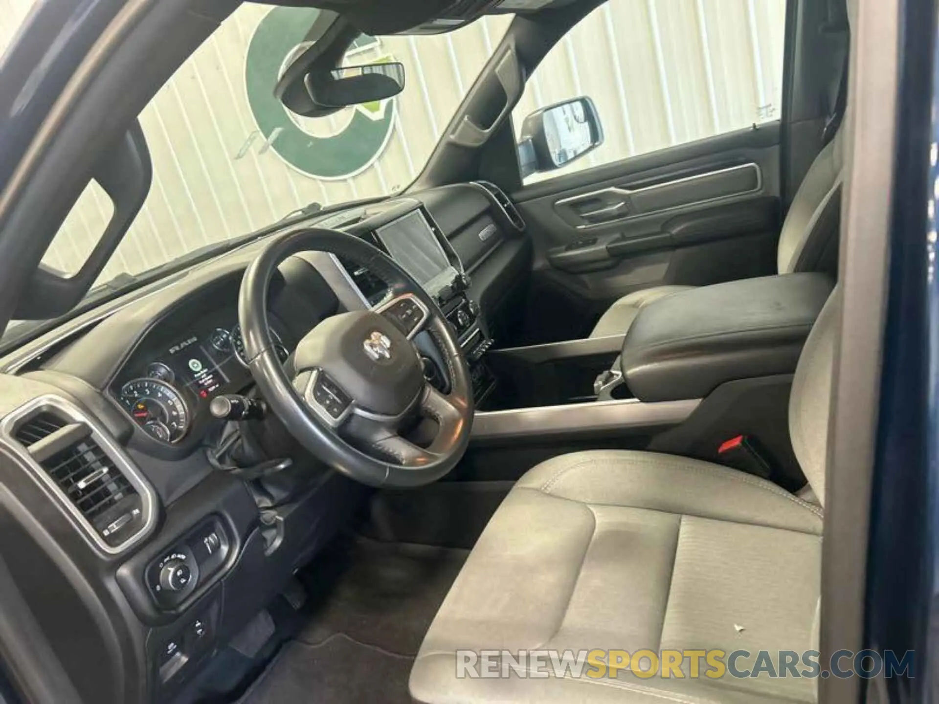 1 Photograph of a damaged car 1C6RRFFG9NN365220 RAM 1500 2022