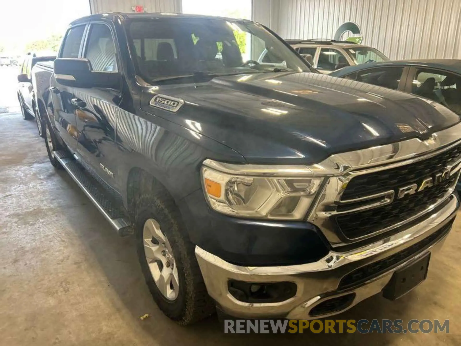 9 Photograph of a damaged car 1C6RRFFG9NN365220 RAM 1500 2022