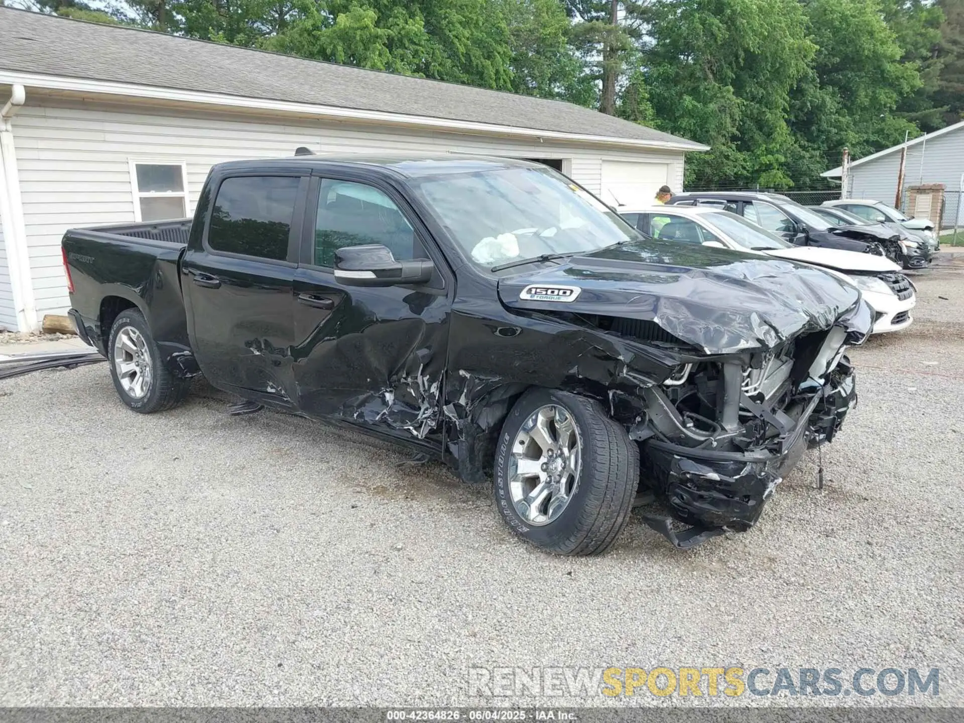 1 Photograph of a damaged car 1C6RRFFG9NN400564 RAM 1500 2022