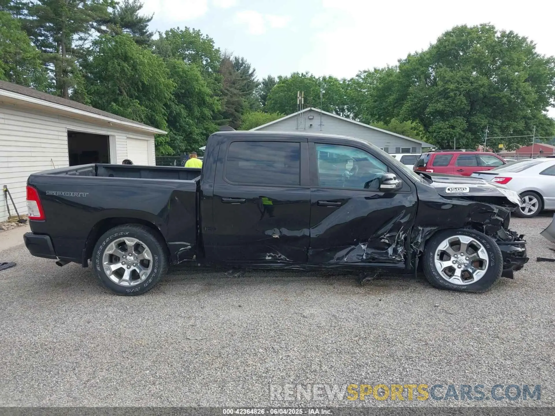 14 Photograph of a damaged car 1C6RRFFG9NN400564 RAM 1500 2022