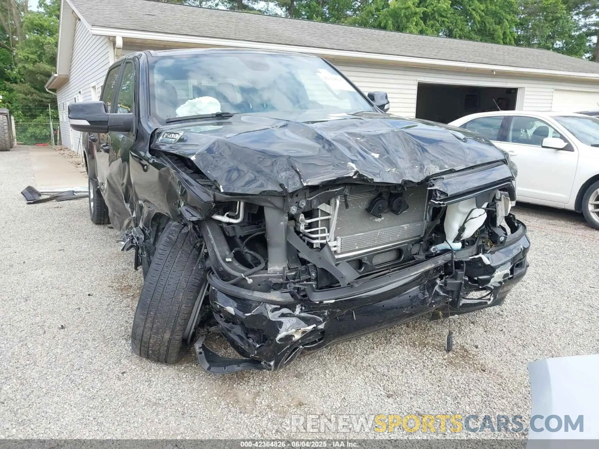 6 Photograph of a damaged car 1C6RRFFG9NN400564 RAM 1500 2022