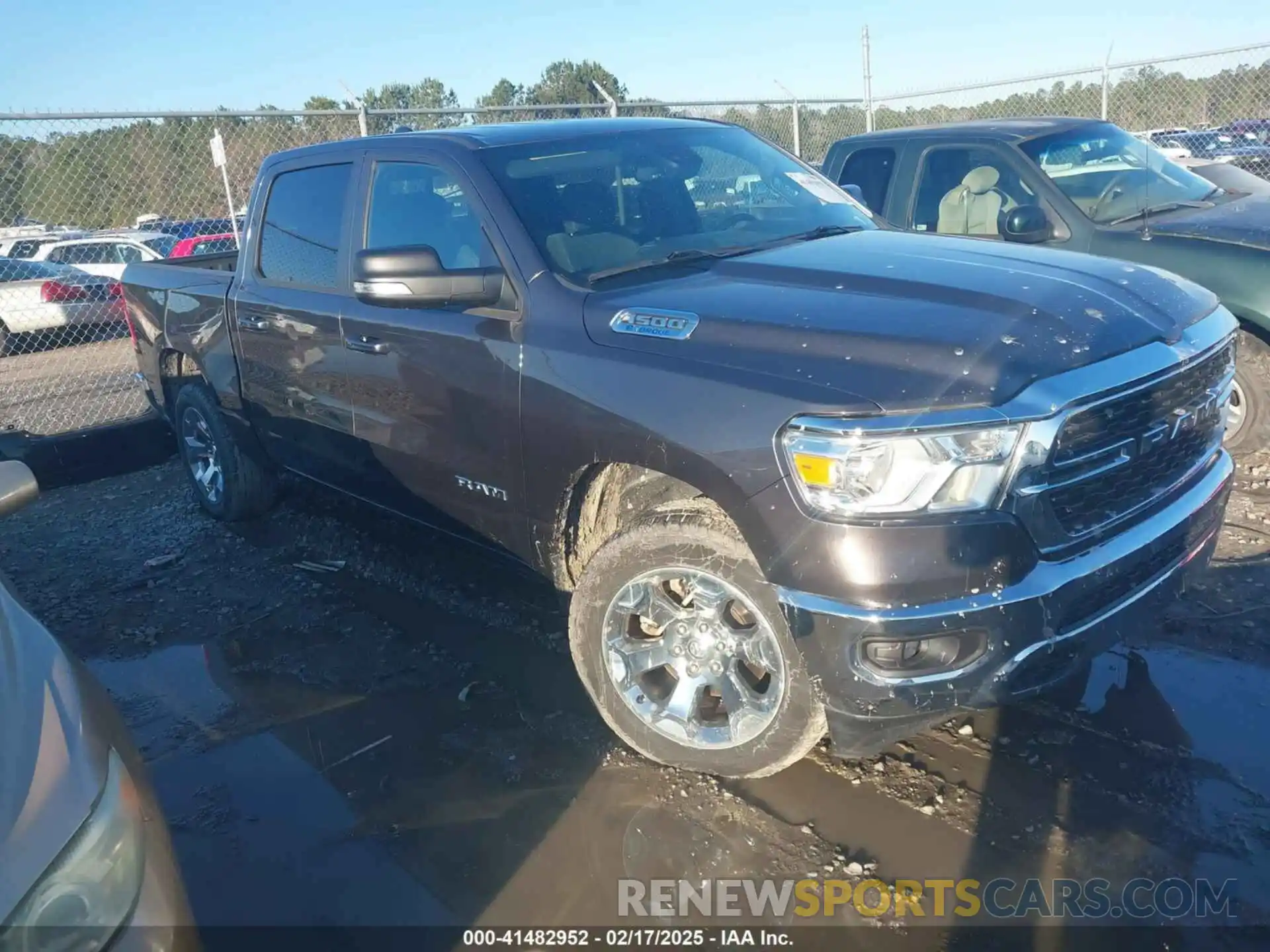 1 Photograph of a damaged car 1C6RRFFGXNN385461 RAM 1500 2022