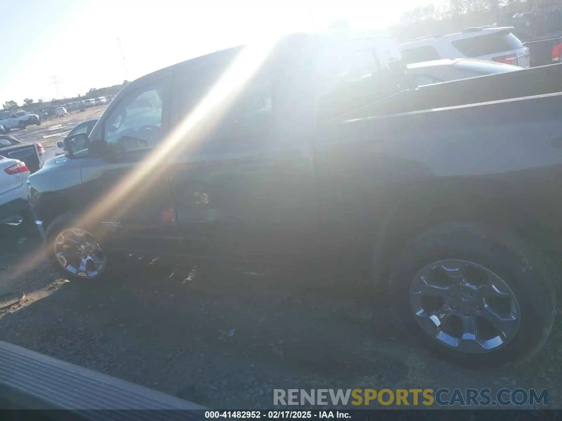 13 Photograph of a damaged car 1C6RRFFGXNN385461 RAM 1500 2022