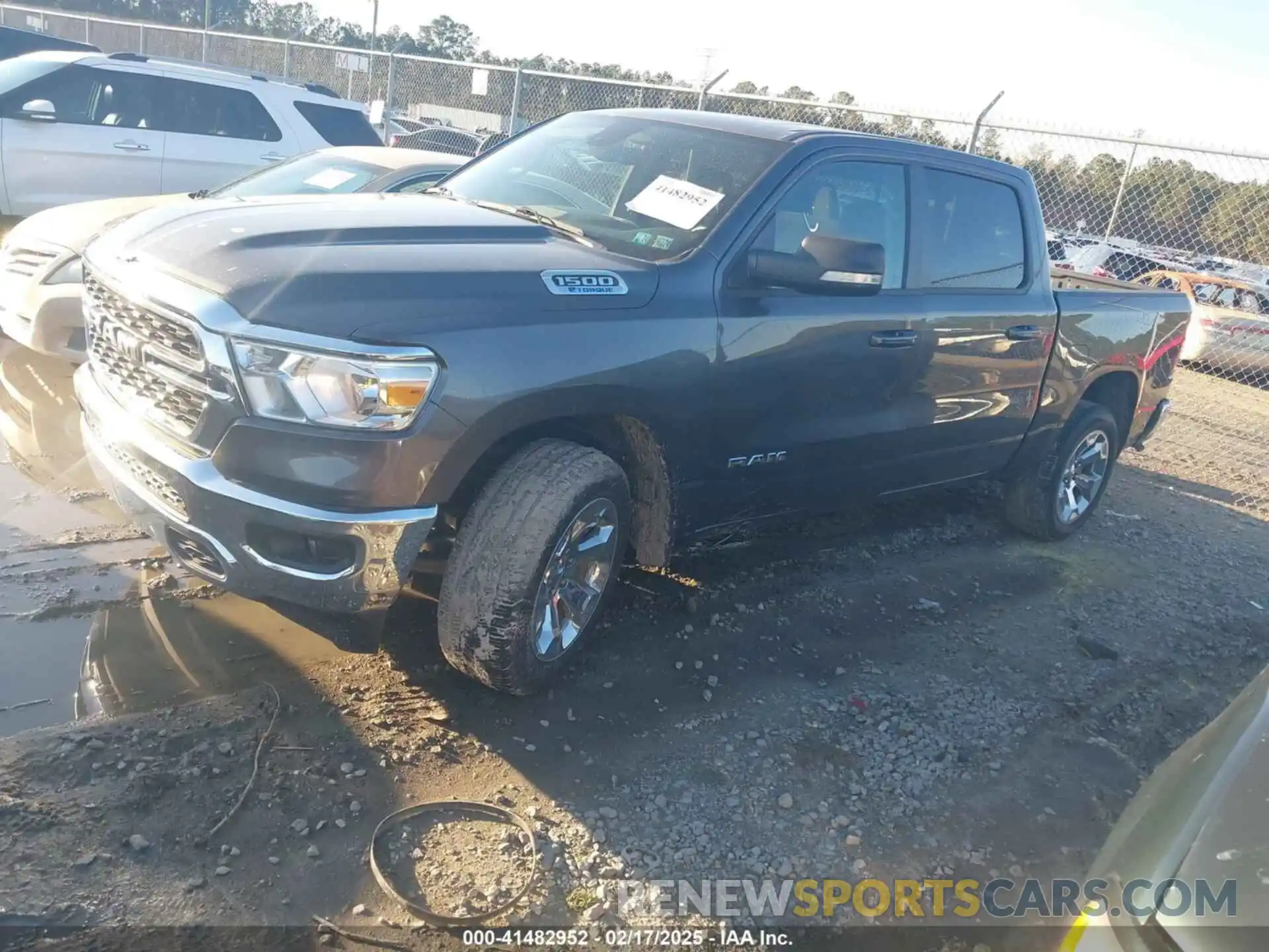 2 Photograph of a damaged car 1C6RRFFGXNN385461 RAM 1500 2022