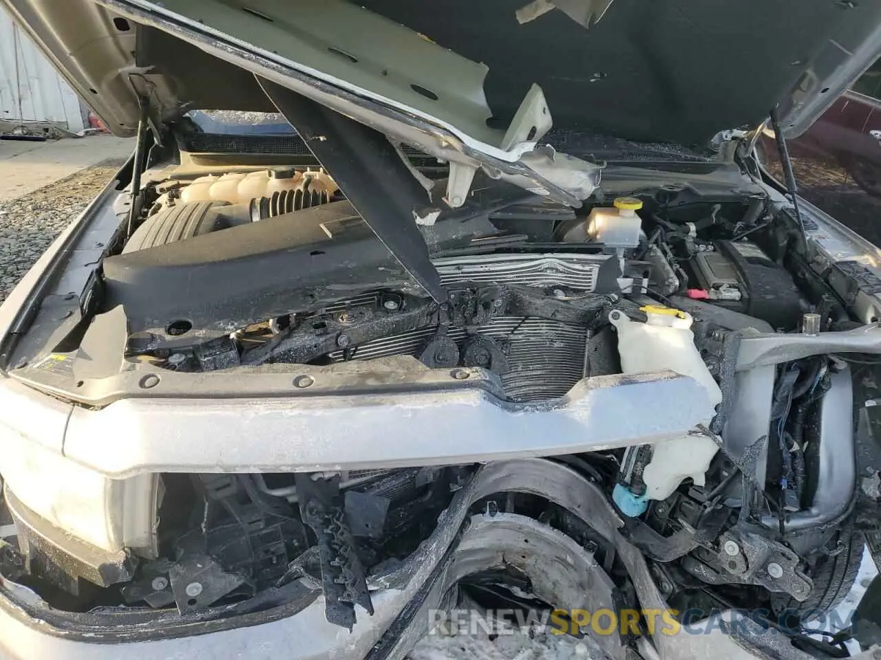 11 Photograph of a damaged car 1C6RRFFGXNN390837 RAM 1500 2022