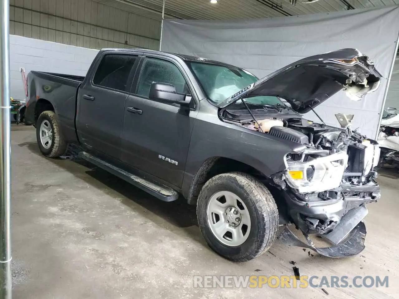 4 Photograph of a damaged car 1C6RRFNGXNN333734 RAM 1500 2022