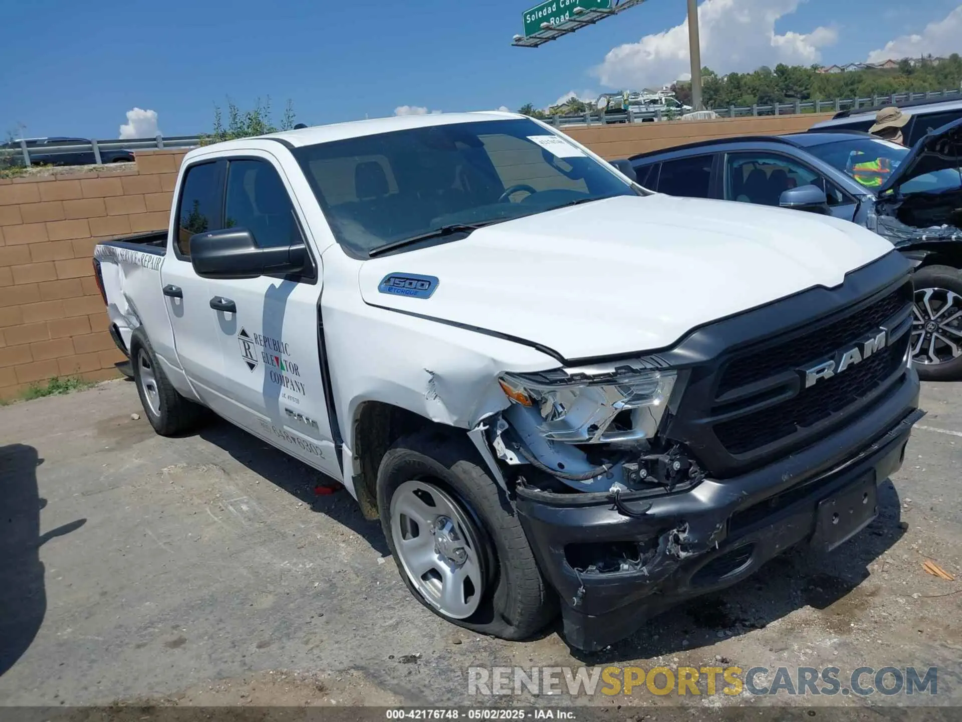 1 Photograph of a damaged car 1C6SRECG7NN435846 RAM 1500 2022