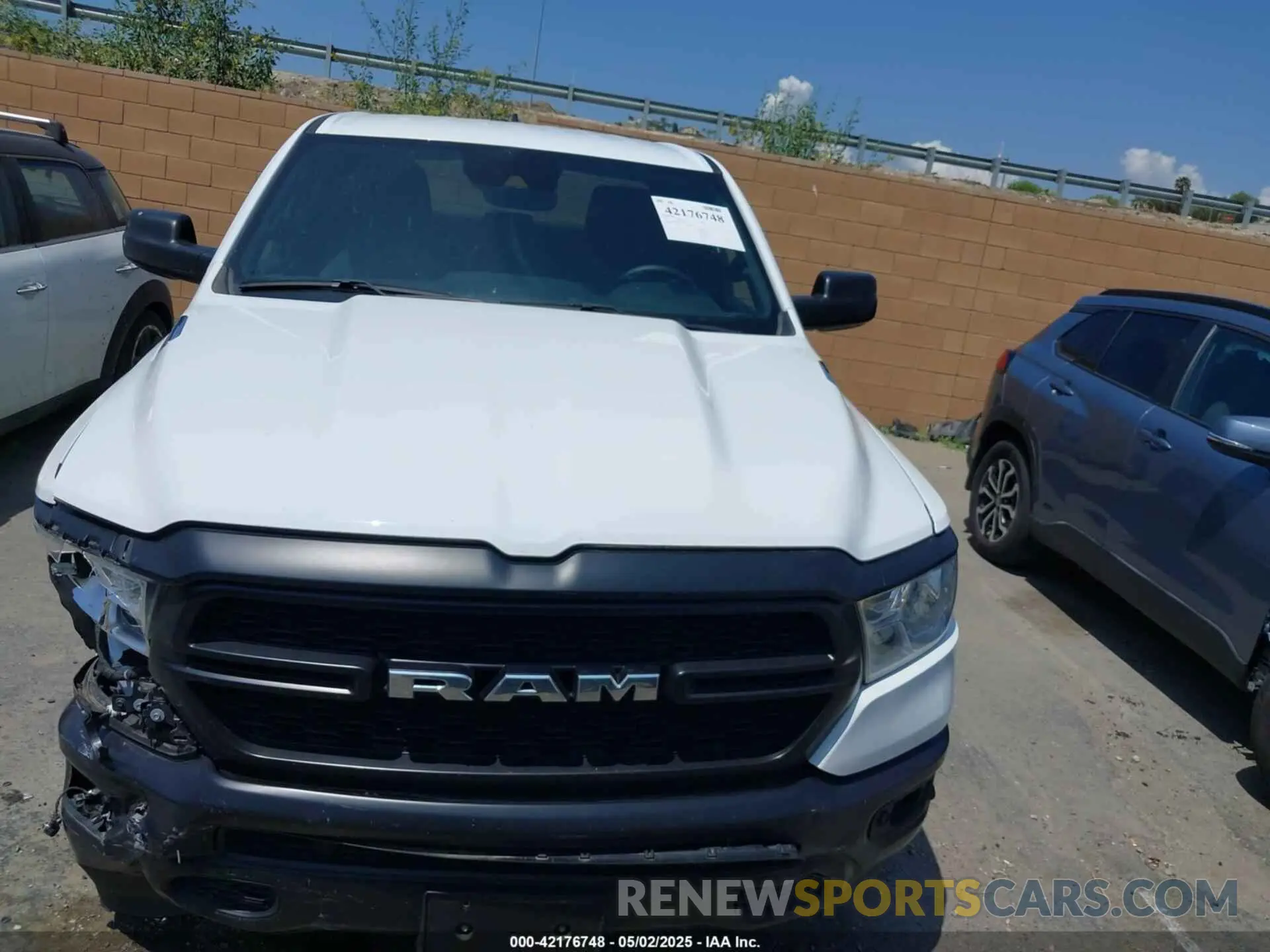 12 Photograph of a damaged car 1C6SRECG7NN435846 RAM 1500 2022