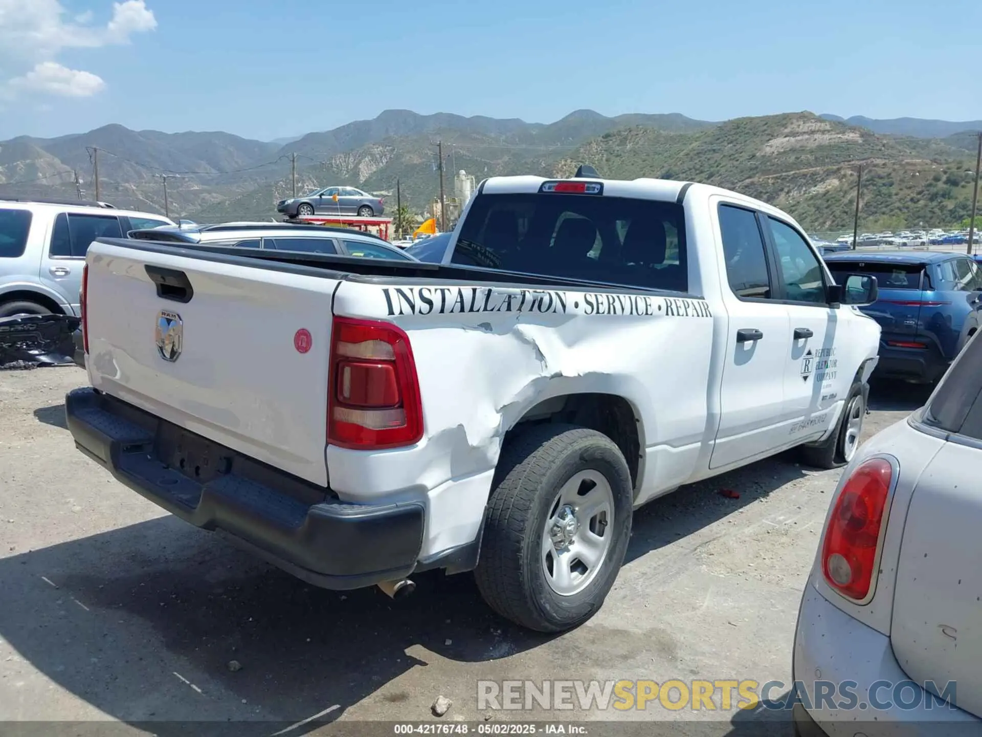 13 Photograph of a damaged car 1C6SRECG7NN435846 RAM 1500 2022