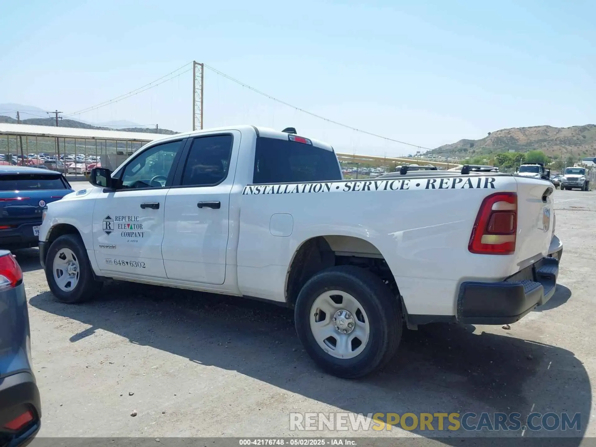 14 Photograph of a damaged car 1C6SRECG7NN435846 RAM 1500 2022